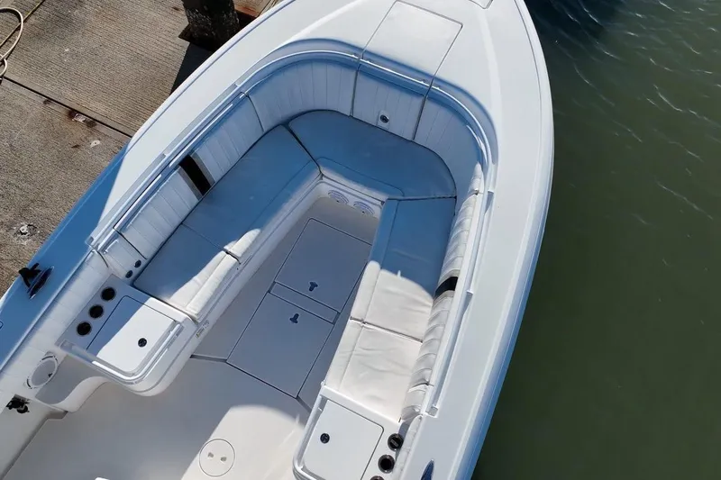 Slide: The Image of 2013 Intrepid 375 Center Console boat with spacious seating and sleek design. - 8