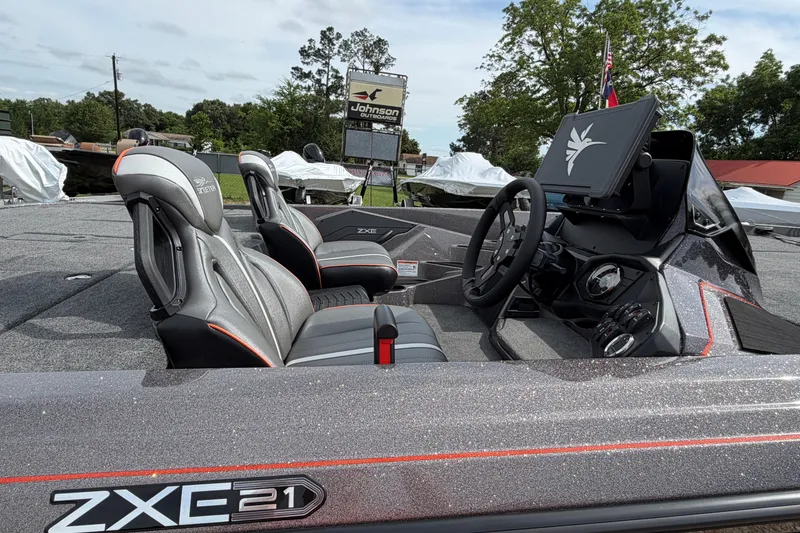 Slide: The Image of 2026 Skeeter ZXE21 boat interior with sleek seats and modern dashboard design. - 2