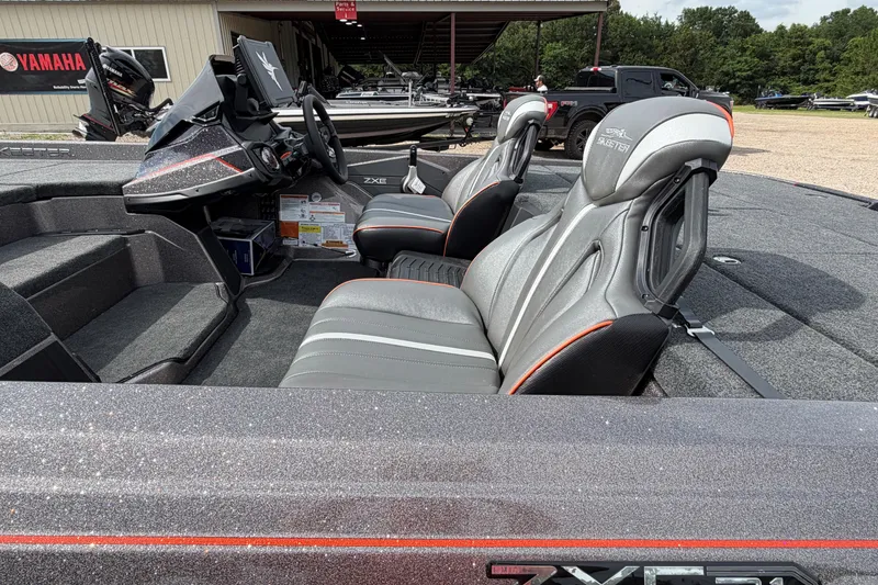 Slide: The Image of 2026 Skeeter ZXE21 boat interior with sleek seats and modern dashboard design. - 3
