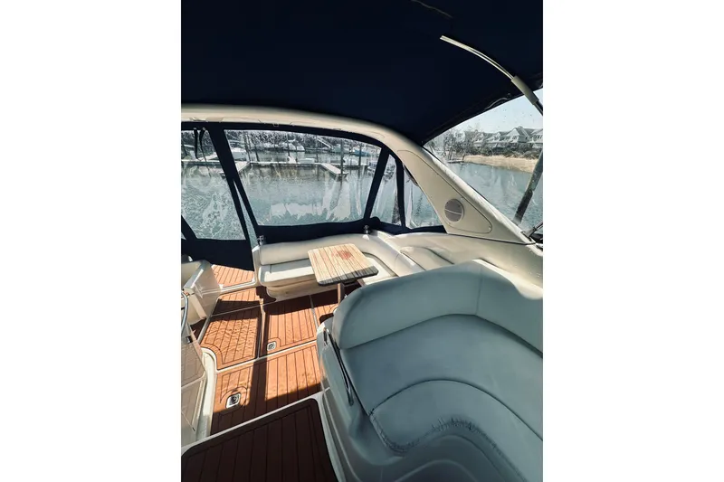 Slide: The Image of Interior view of 1999 Cranchi Endurance 39 yacht with seating and table. - 13