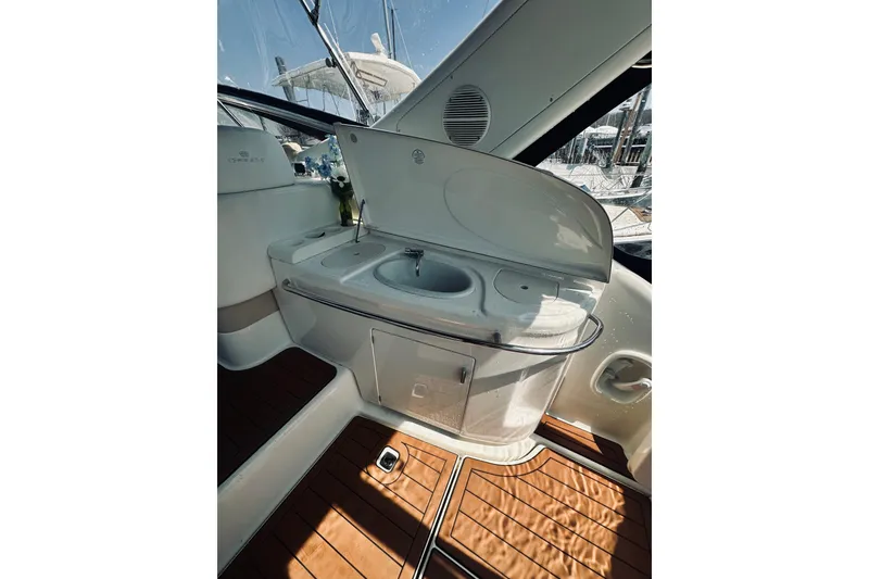 Slide: The Image of 1999 Cranchi Endurance 39 yacht interior with sink and wooden flooring. - 14