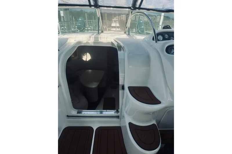 Slide: The Image of Interior view of 1999 Cranchi Endurance 39 yacht with steps and seating area. - 21