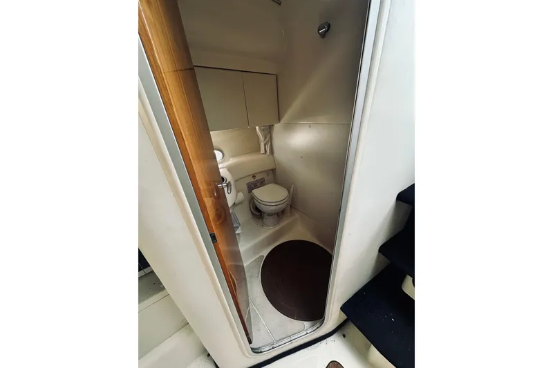 Slide: The Image of Bathroom interior of 1999 Cranchi Endurance 39 yacht, featuring compact design and modern fixtures. - 31