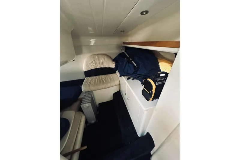 Slide: The Image of Interior cabin of 1999 Cranchi Endurance 39 with seating and storage. - 34