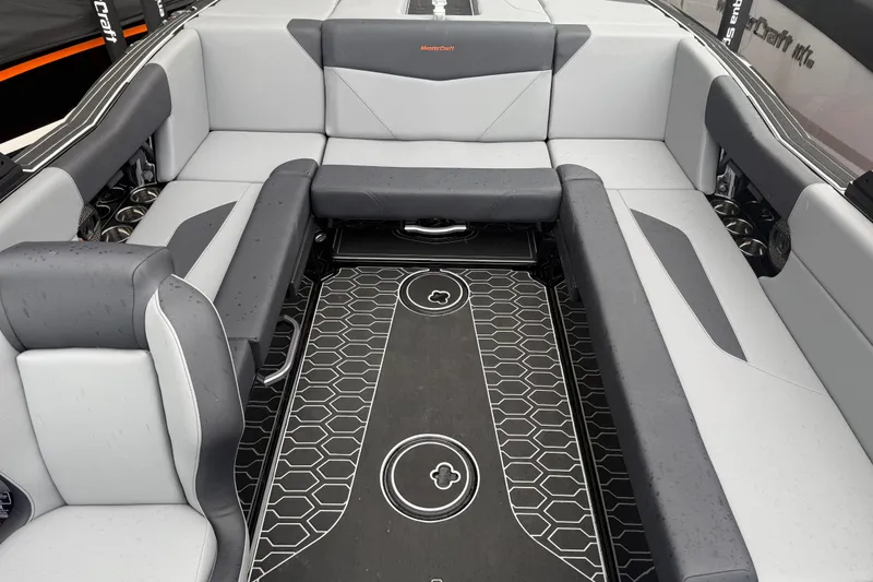 Slide: The Image of Luxurious interior of 2025 MasterCraft NXT23 boat with sleek seating and modern flooring. - 17