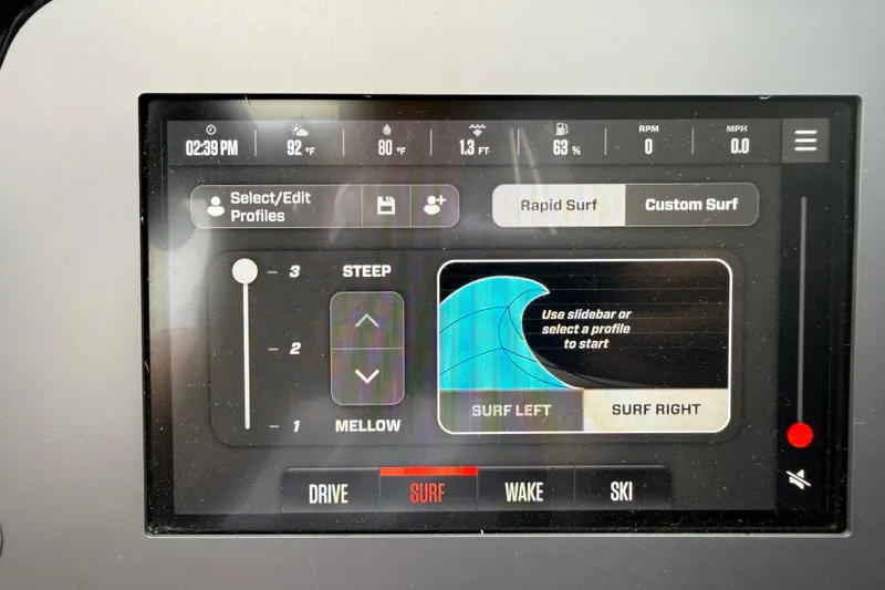 Slide: The Image of Touchscreen display of 2025 MasterCraft NXT23 boat showing surf settings and controls. - 9