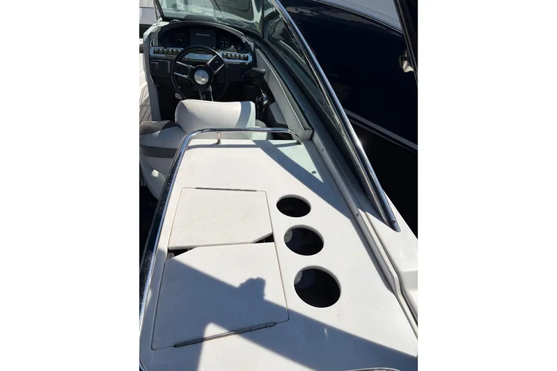 Slide: The Image of 2019 Monterey 278SS Super Sport boat interior with steering wheel and cup holders. - 10