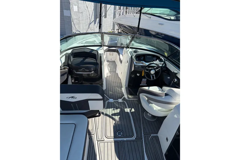 Slide: The Image of 2019 Monterey 278SS Super Sport boat interior with sleek seating and modern dashboard. - 17