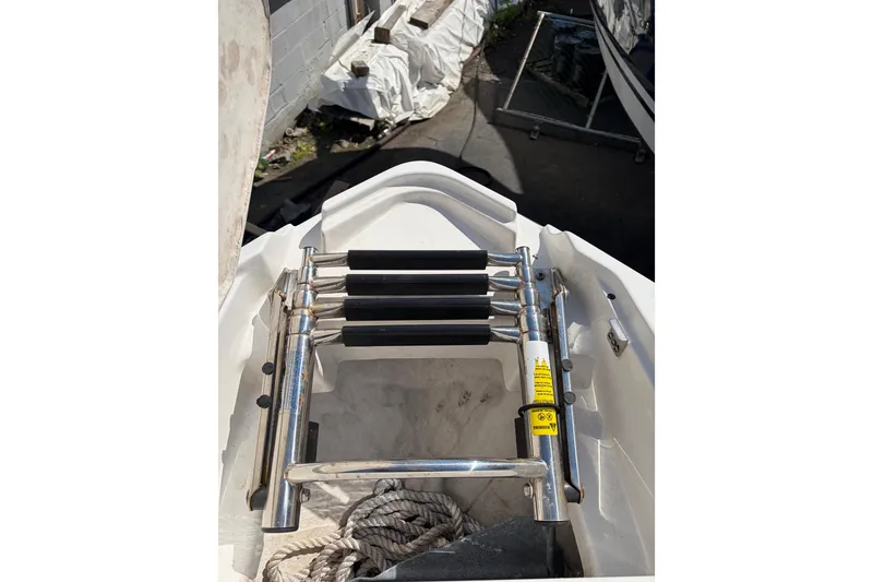 Slide: The Image of Stainless steel ladder on a 2019 Monterey 278SS Super Sport boat. - 19