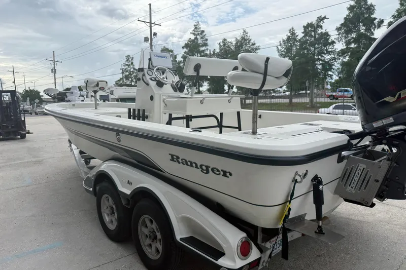 Slide: The Image of 2007 Ranger 2200 Bay Ranger boat on trailer, parked outdoors. - 5