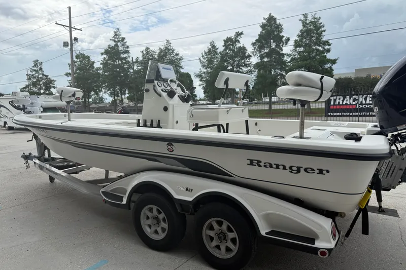 Slide: The Image of 2007 Ranger 2200 Bay Ranger boat on trailer, parked outdoors. - 6