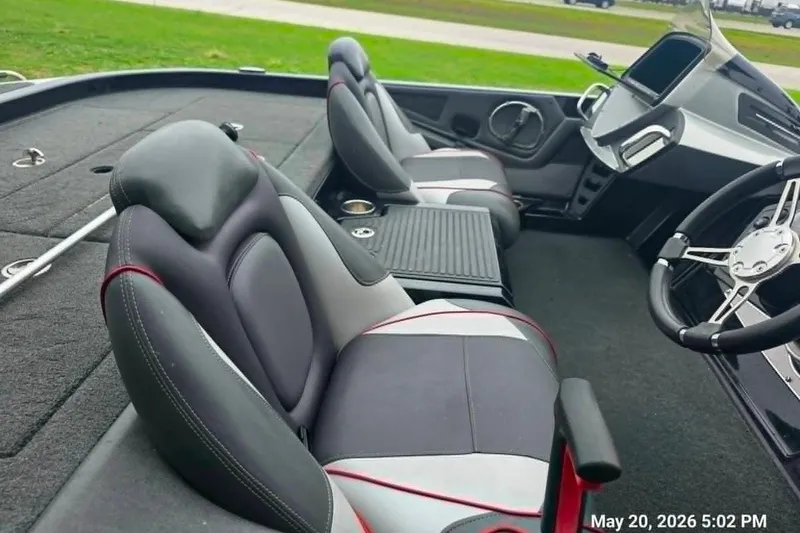 Slide: The Image of 2017 Ranger Z519 boat interior with dual seats and steering wheel, showcasing modern design. - 3