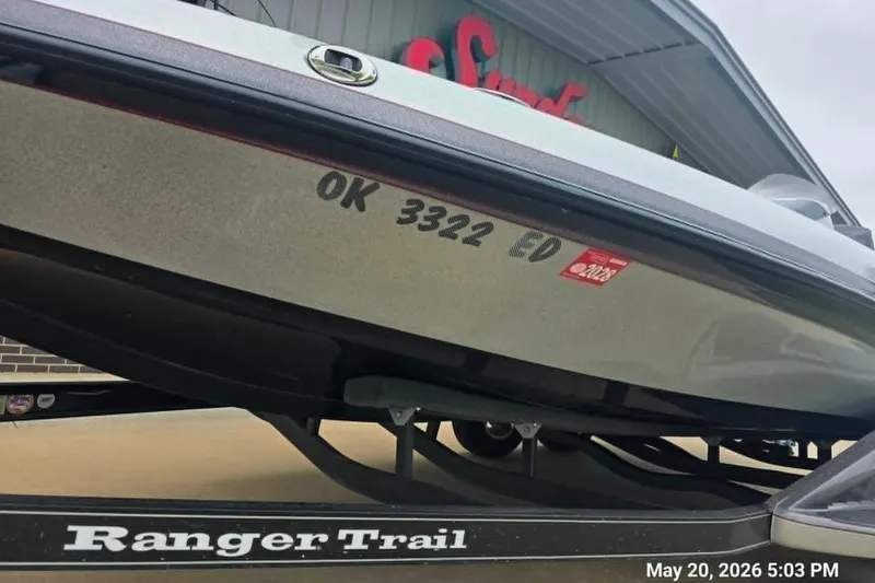 Slide: The Image of 2017 Ranger Z519 boat on trailer, registration OK 3322 ED, parked outside a building. - 8
