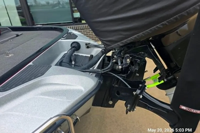 Slide: The Image of 2017 Ranger Z519 boat engine area with protective cover, photographed on May 20, 2026. - 9