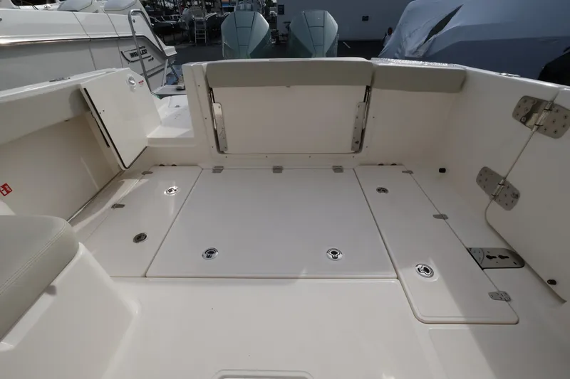 Slide: The Image of The image shows the spacious cockpit of a 2027 Boston Whaler 280 Vantage. - 10
