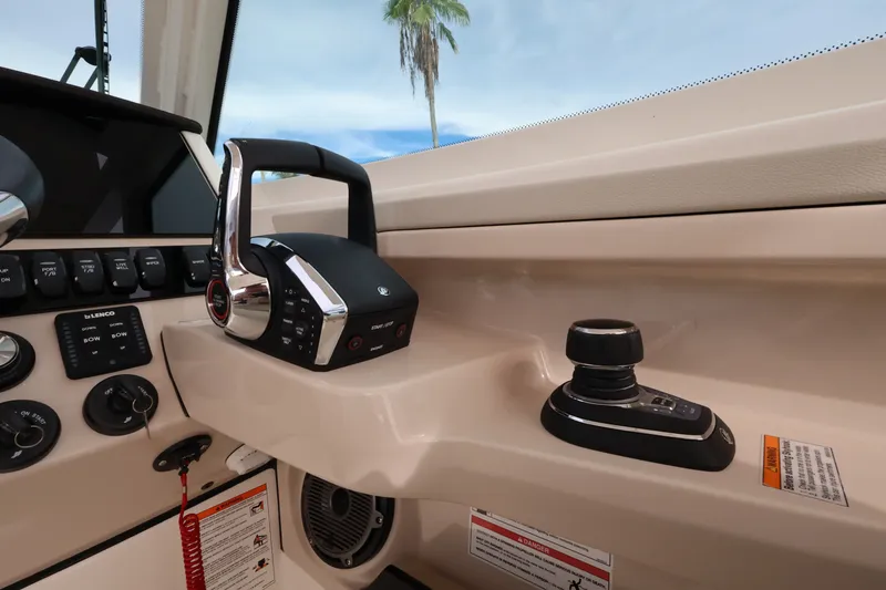 Slide: The Image of The image shows the cockpit of a Boston Whaler 280 Vantage with modern controls. - 21