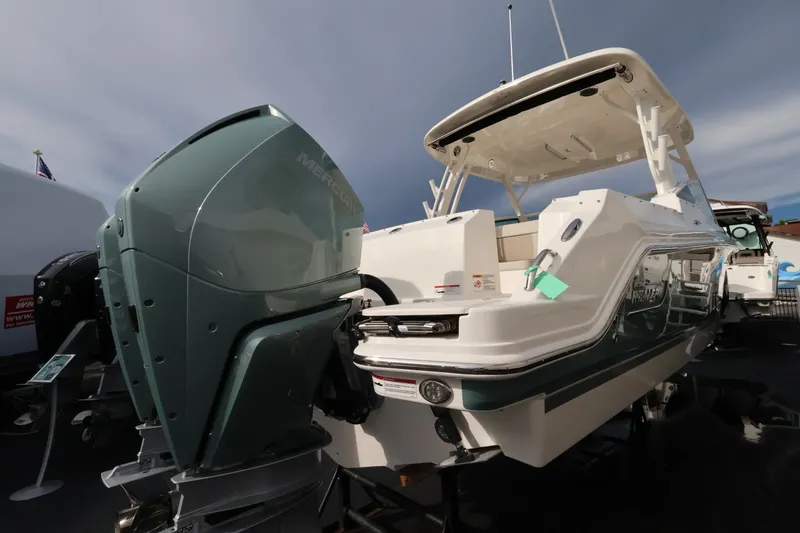 Slide: The Image of A 2027 Boston Whaler 280 Vantage with dual outboard engines and a spacious deck. - 5
