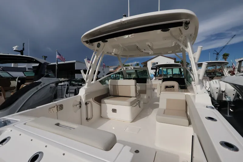 Slide: The Image of The image shows a modern boat with a spacious deck and comfortable seating. - 8