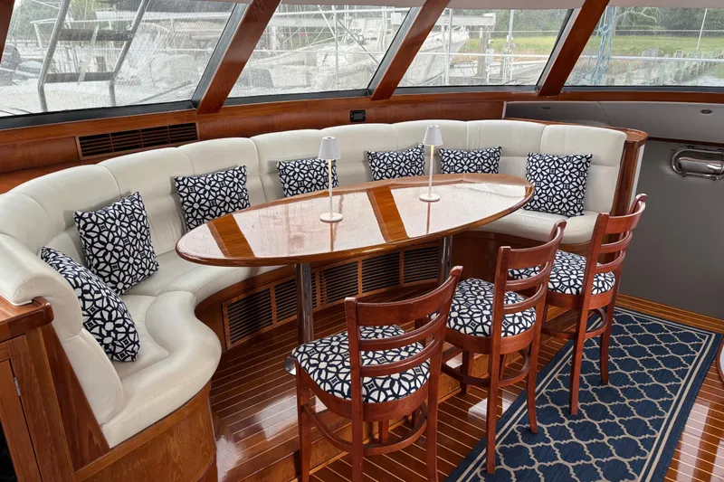 Slide: The Image of Luxurious interior of 2006 Lidgard Custom Catamaran with elegant seating and patterned cushions. - 12