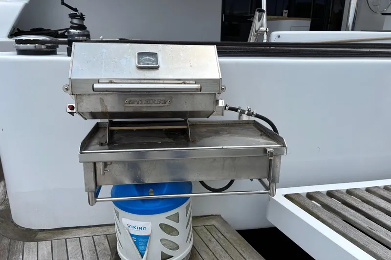 Slide: The Image of Outdoor grill on 2006 Lidgard Custom Catamaran deck, featuring a Spitfire barbecue. - 39