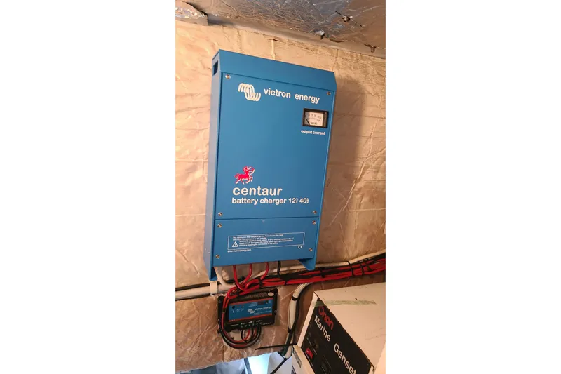 Slide: The Image of Victron Energy Centaur battery charger in 2006 Lidgard Custom Catamaran. - 43