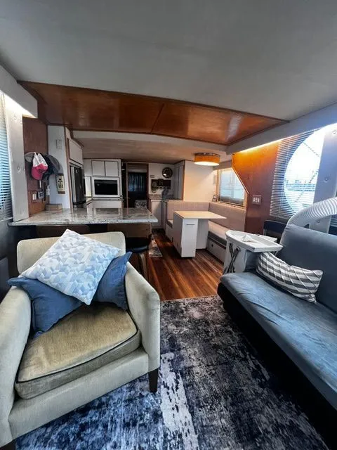 Slide: The Image of Interior of a 1997 Bluewater Yachts 510 with modern furnishings. - 9