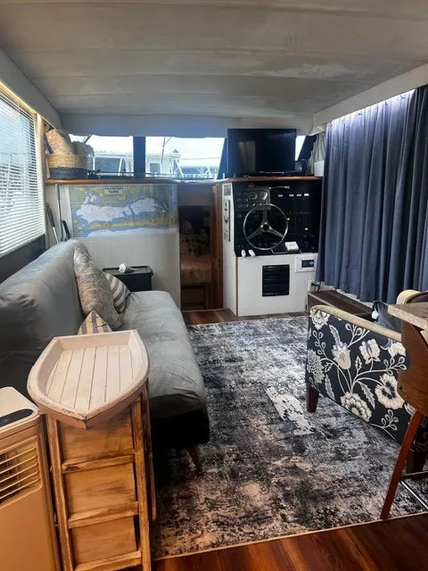 Slide: The Image of Interior of a 1997 Bluewater Yachts 510 with cozy living area. - 10