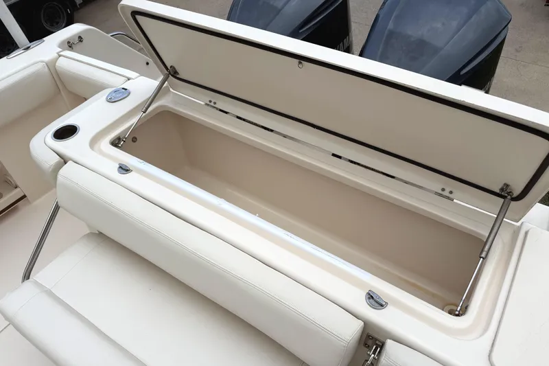 Slide: The Image of Open storage compartment on 2018 Grady-White Canyon 306 boat, showcasing spacious interior. - 36