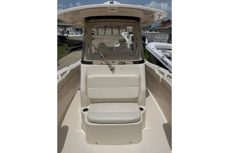 Slide: The Image of 2018 Grady-White Canyon 306 boat interior with seating and helm station. - 39