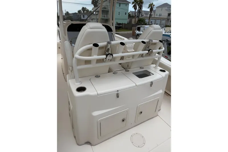 Slide: The Image of 2018 Grady-White Canyon 306 boat interior with seating and storage compartments. - 42