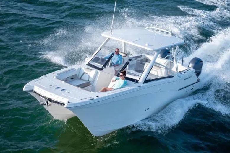 The Image of Manufacturer Provided Image: 2026 World Cat 280 DC-X cruising on open water, showcasing sleek design and performance. - 0