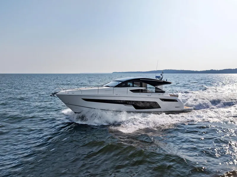 Slide: The Image of 2025 Fairline Targa 50 GT yacht cruising on open water. - 1