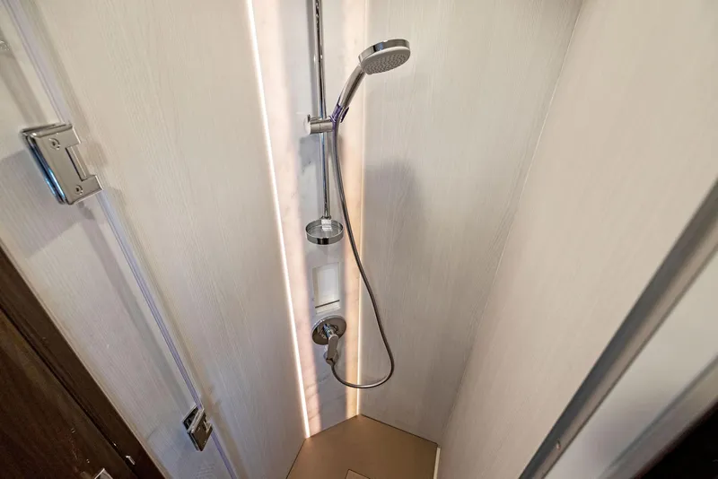 Slide: The Image of Shower area in 2025 Fairline Targa 50 GT yacht, featuring modern fixtures and sleek design. - 45