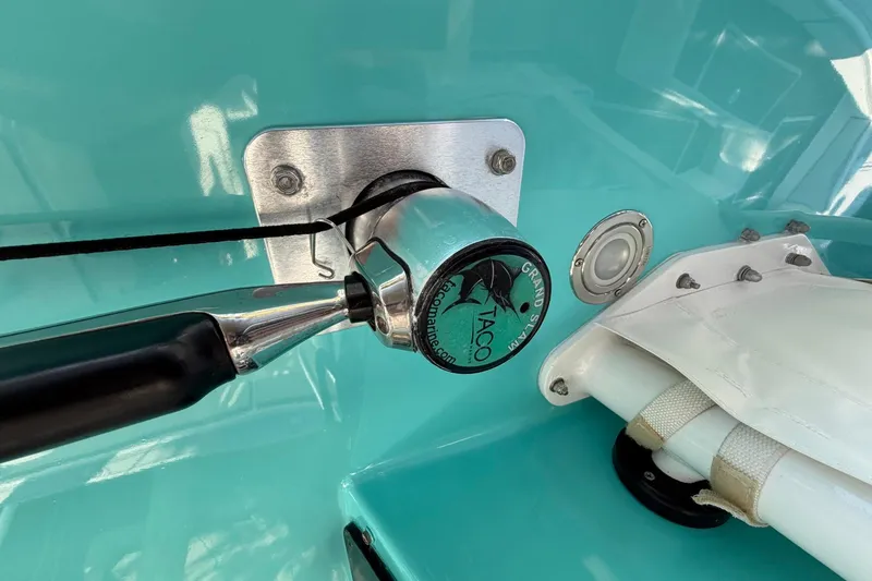 Slide: The Image of Close-up of a 2002 Regulator 26 Center Console boat control lever. - 18