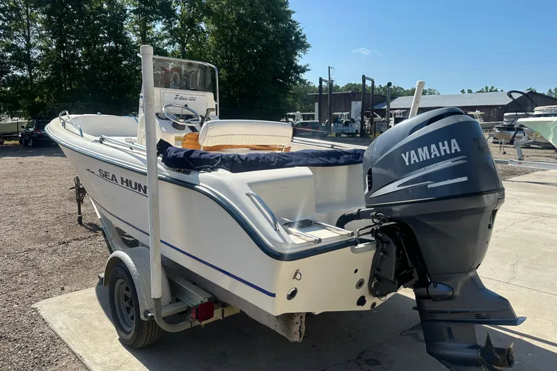 Slide: The Image of 2005 Sea Hunt Triton 186 boat with Yamaha outboard motor on trailer. - 11