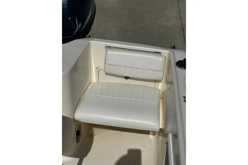 Slide: The Image of White seating on a 2005 Sea Hunt Triton 186 boat, showcasing clean upholstery. - 18