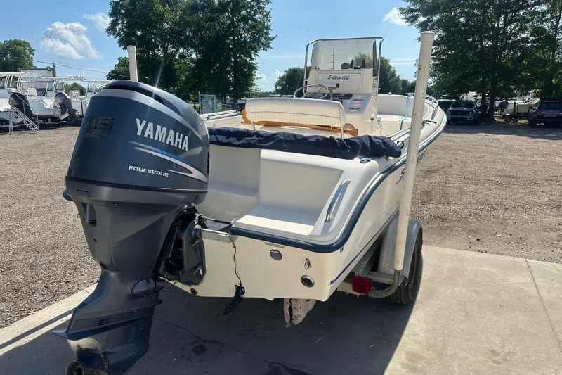 Slide: The Image of 2005 Sea Hunt Triton 186 boat with Yamaha four-stroke engine on trailer. - 3