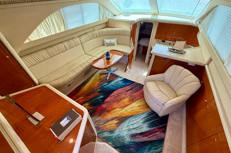 Slide: The Image of Luxurious interior of 2000 Sea Ray 380 Aft Cabin yacht with elegant furnishings. - 13