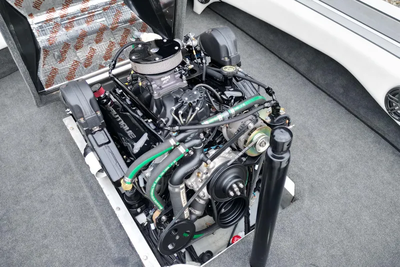 Slide: The Image of 1994 Nautique Ski Nautique engine compartment with detailed view of the engine components. - 15