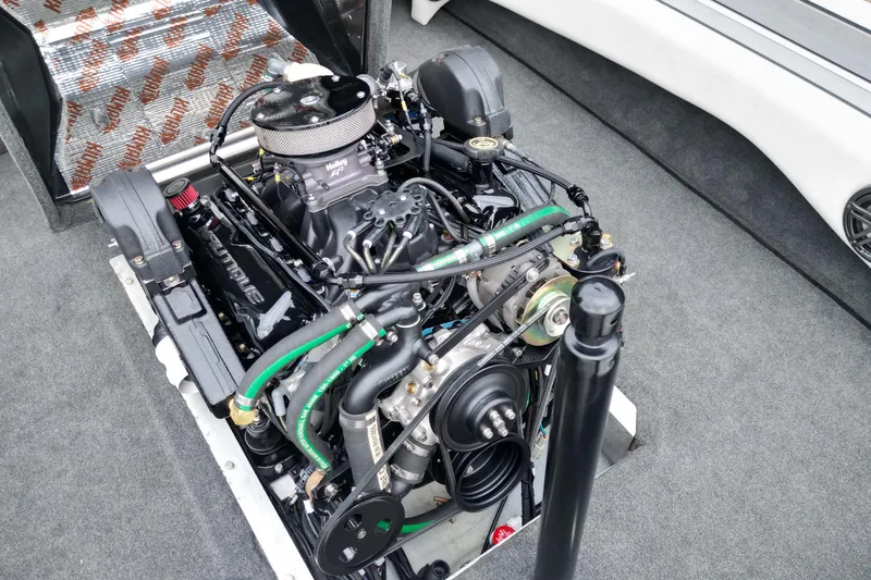 Slide: The Image of 1994 Nautique Ski Nautique engine compartment with detailed view of the engine components. - 16