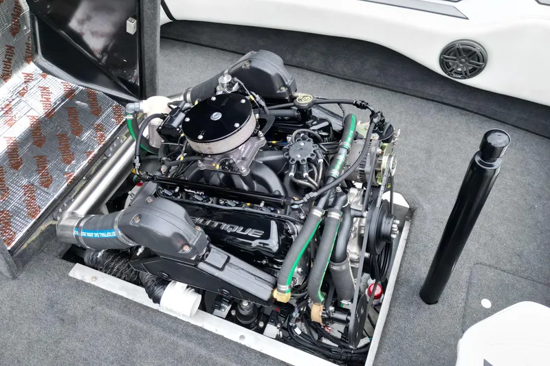 Slide: The Image of 1994 Nautique Ski Nautique engine compartment with detailed view of the engine components. - 18