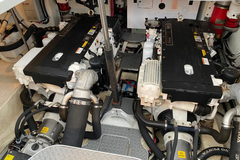Slide: The Image of Engine room of a 2007 Formula 40 Performance Cruiser with dual engines and mechanical components. - 11
