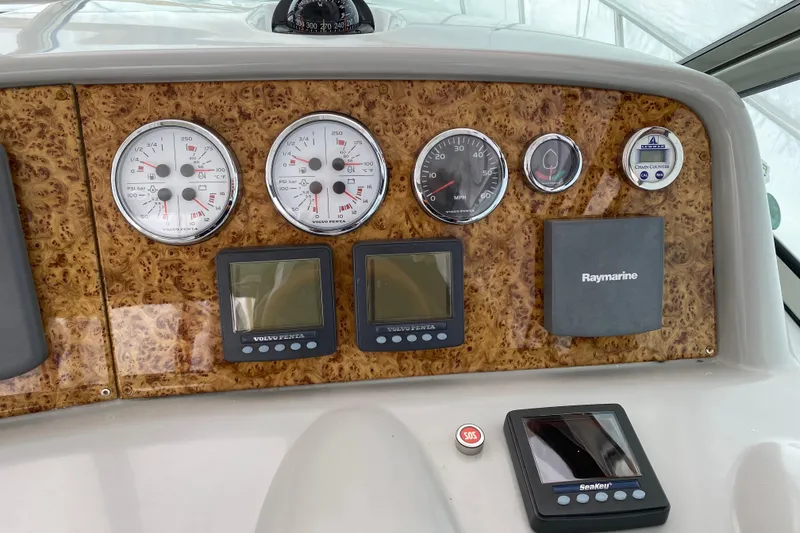 Slide: The Image of Dashboard of a 2007 Formula 40 Performance Cruiser with gauges and navigation equipment. - 5