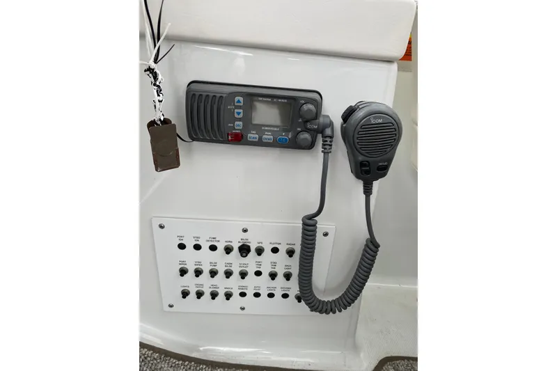 Slide: The Image of Control panel of a 2007 Formula 40 Performance Cruiser with radio and switches. - 6