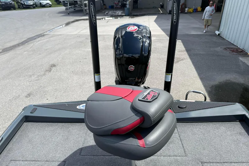 Slide: The Image of 2024 Ranger RT188P boat with Power-Pole anchors and cushioned seat on deck. - 13