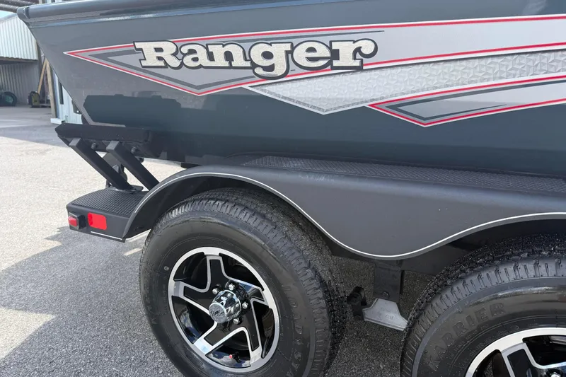 Slide: The Image of 2024 Ranger RT188P boat trailer with stylish wheels and sleek design. - 3