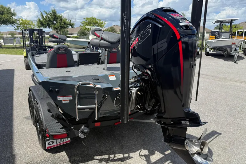 Slide: The Image of 2024 Ranger RT188P boat with Mercury Pro XS 115 engine, parked outdoors. - 6
