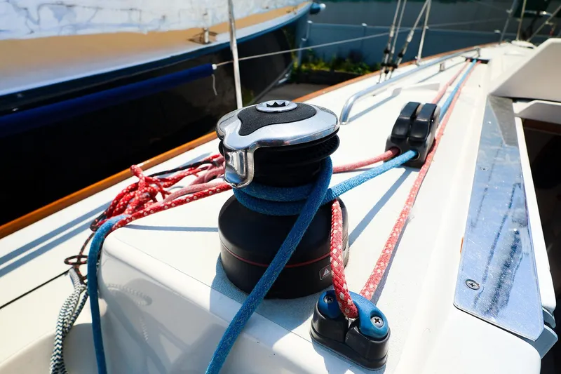 Slide: The Image of Close-up of 2008 J Boats J/100 sailboat deck with winch and colorful ropes. - 14