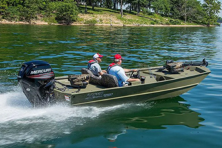 Slide: The Image of Manufacturer Provided Image: 2025 Lowe Roughneck 1860SC boat cruising on a lake with two passengers. - 21