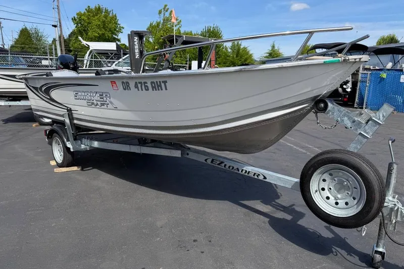 The Image of 2023 Smoker Craft Alaskan 15 boat on trailer, parked outdoors. - 1